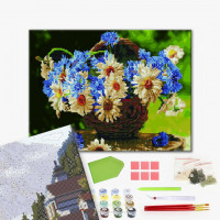 Польові квіти в корзинці Польові квіти в корзинці